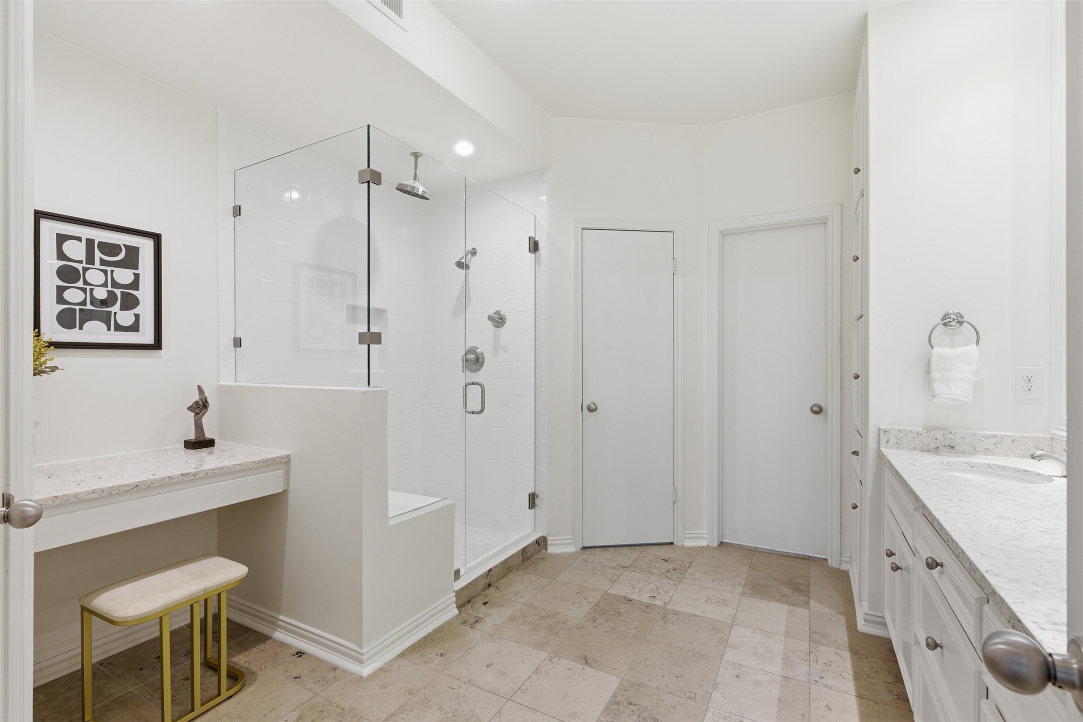 8101 Raintree Place Austin, TX 78759 - Photo 17 of 36 a spacious bathroom with a tub sink and mirror