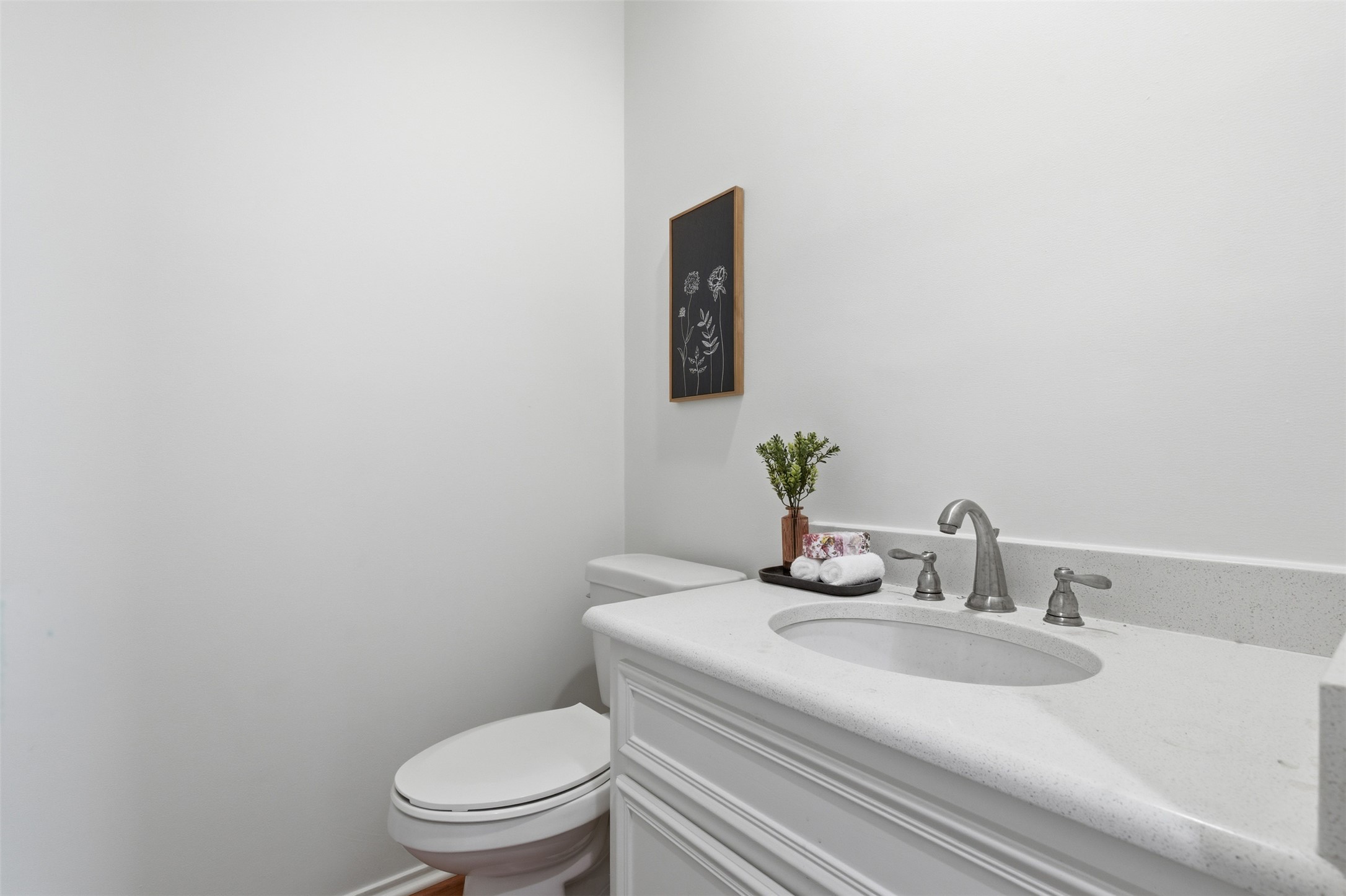 8101 Raintree Place Austin, TX 78759 - Photo 24 of 36 a bathroom with a sink and a toilet