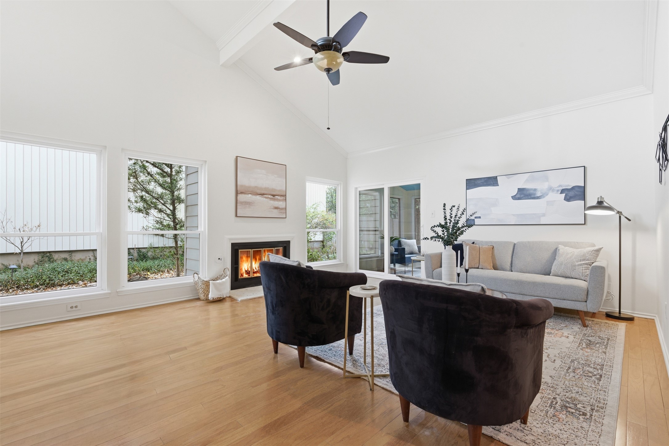 8101 Raintree Place Austin, TX 78759 - Photo 6 of 36 a living room with furniture and a large window