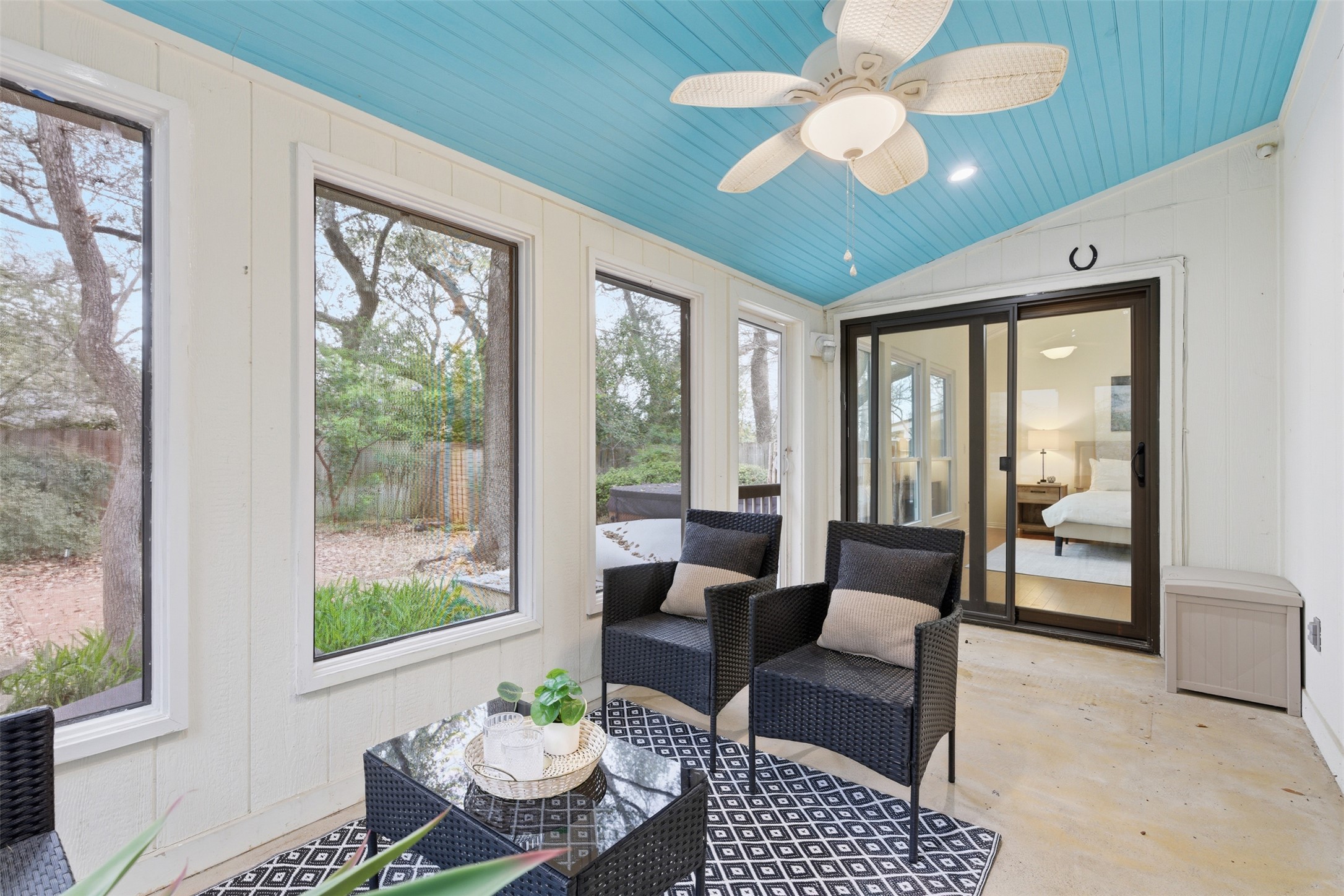 8101 Raintree Place Austin, TX 78759 - Photo 10 of 36 a living room with furniture and a large window