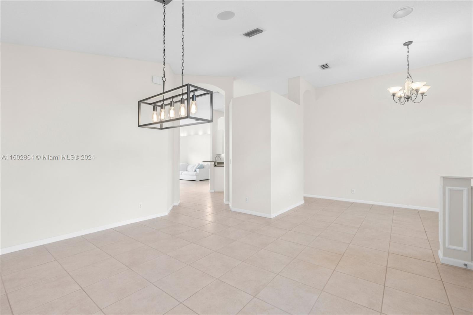 6054 Foster Street Jupiter, FL 33458 - Photo 14 of 50 a view of a room with wooden floor