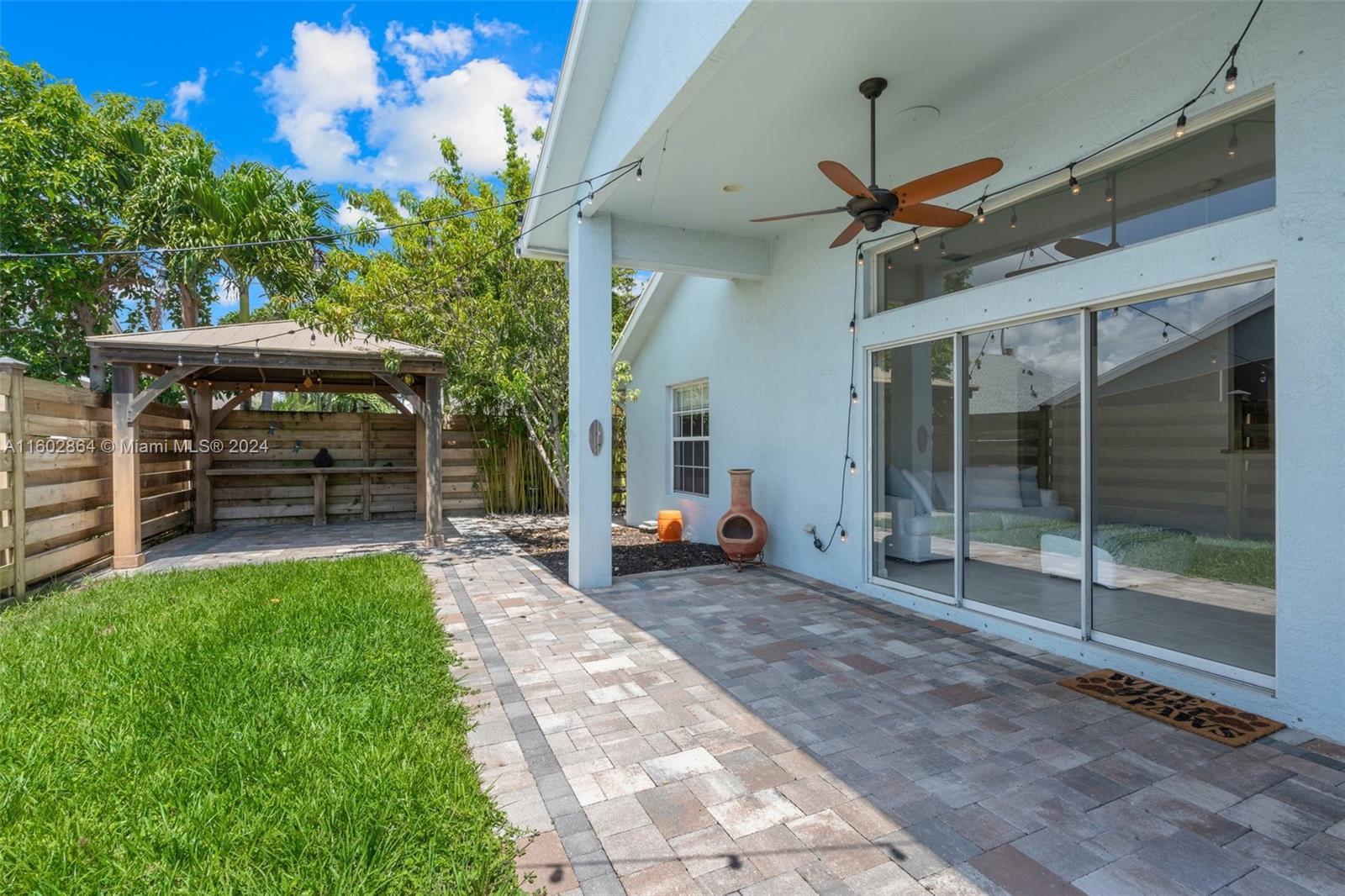 6054 Foster Street Jupiter, FL 33458 - Photo 2 of 50 a view of a porch with furniture
