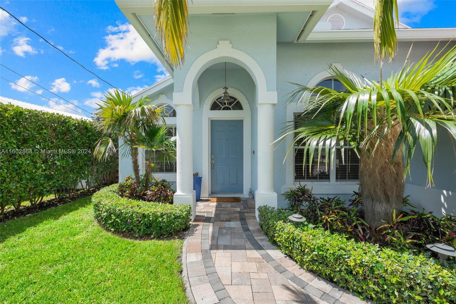 6054 Foster Street Jupiter, FL 33458 - Photo 9 of 50 a view of a house with a sink and garden