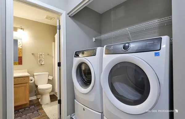 a view of a bathroom with a washer and dryer