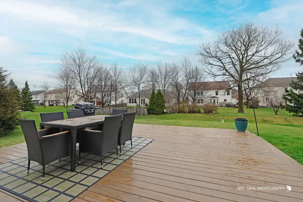 a view of a patio with a yard