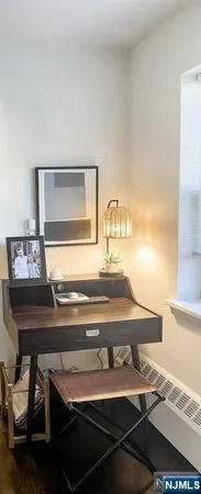 a view of a workspace with furniture