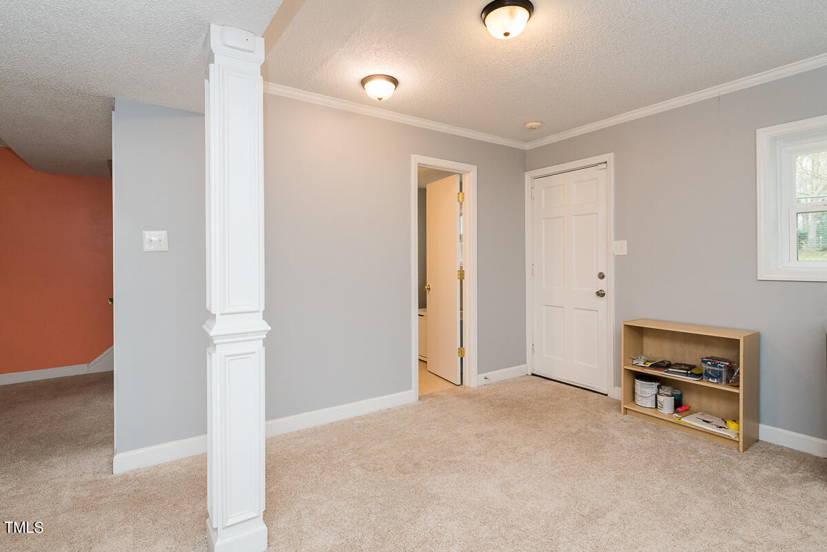 1026 Jerome Road Durham, NC 27713 - Photo 18 of 27 a view of an empty room with a window