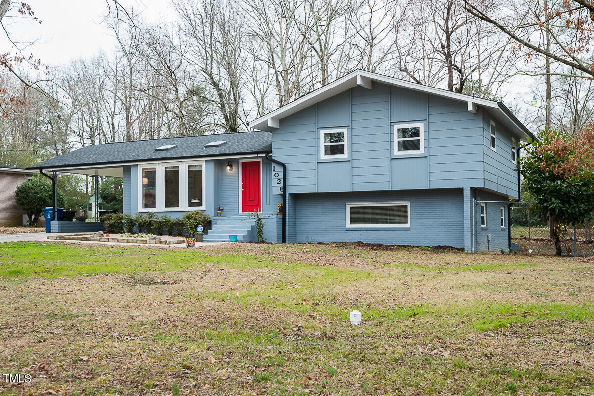 1026 Jerome Road Durham, NC 27713 - Photo 25 of 27 a front view of house with yard and trees