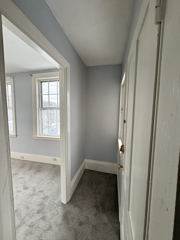 5 Prospect Street, Unit 2 Newburyport, MA 01950 - Photo 6 of 6 an empty room with windows
