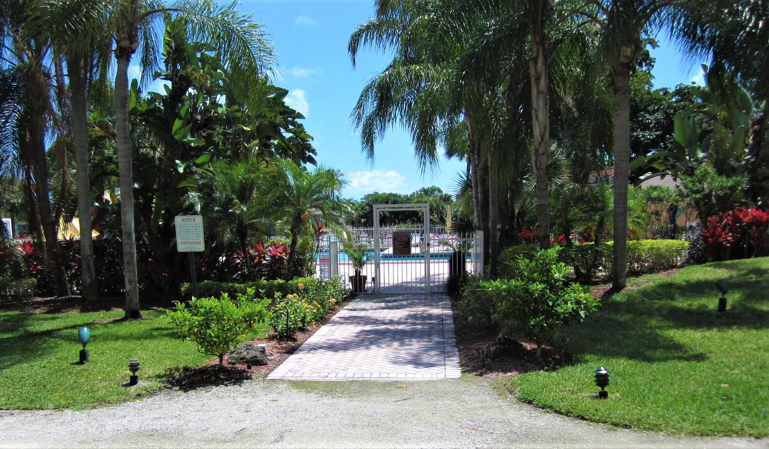 755 Dotterel Road, Unit 1306 Delray Beach, FL 33444 - Photo 32 of 33 pool #2 entrance