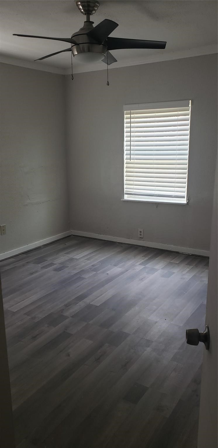 912 Jennetta Street Rosenberg, TX 77471 - Photo 9 of 12 a view of an empty room with a window
