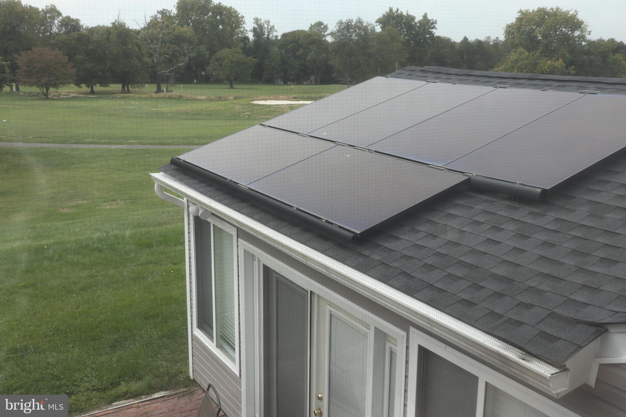 120 Country Club Road Willingboro, NJ 08046 - Photo 5 of 21 Sunroom with solar panels and golf course view