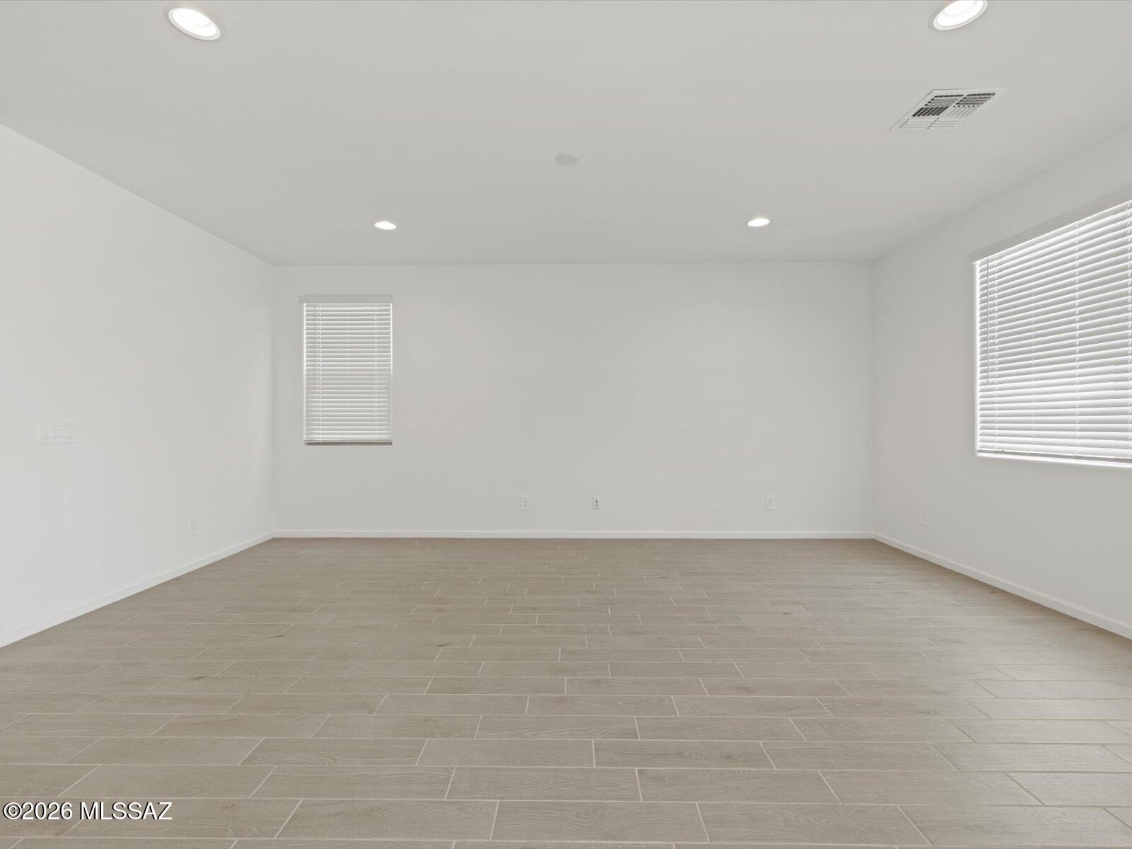 5133 West Gainer Ridge Road Tucson, AZ 85757 - Photo 12 of 16 an empty room with a natural light