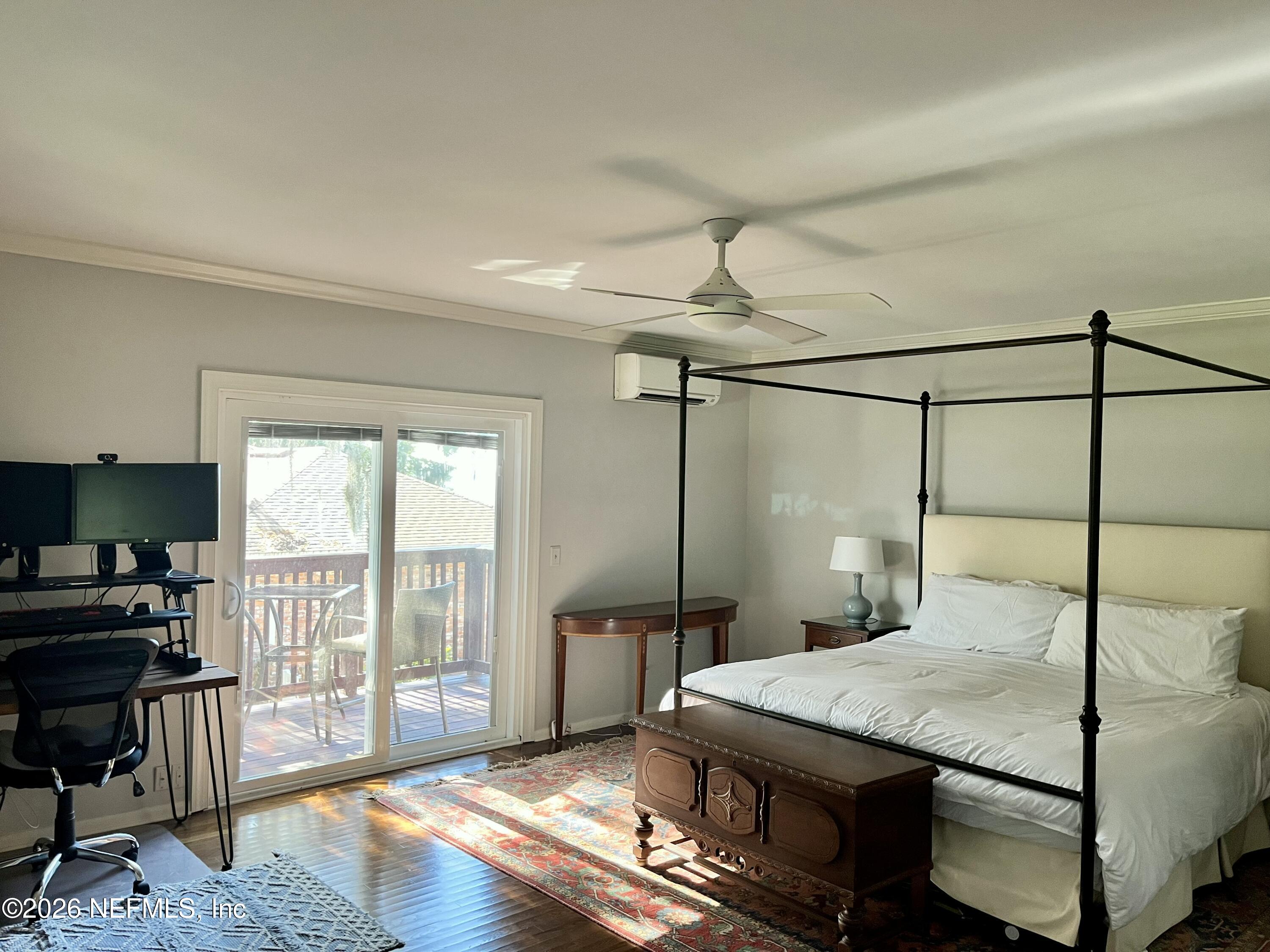 820 Inwood Terrace Jacksonville, FL 32207 - Photo 16 of 31 a bedroom with a bed window and a table in it