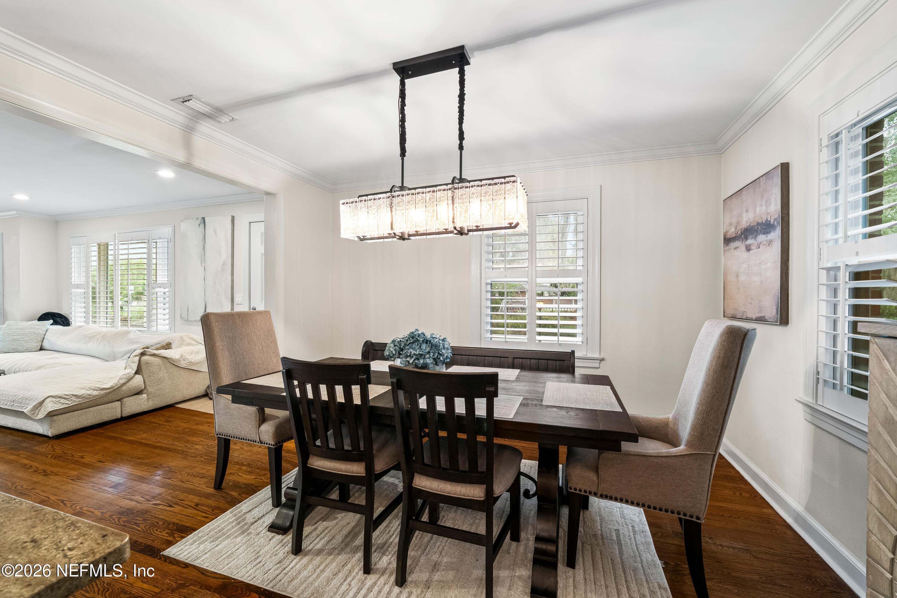 820 Inwood Terrace Jacksonville, FL 32207 - Photo 4 of 31 a view of a dining room with furniture window and wooden floor