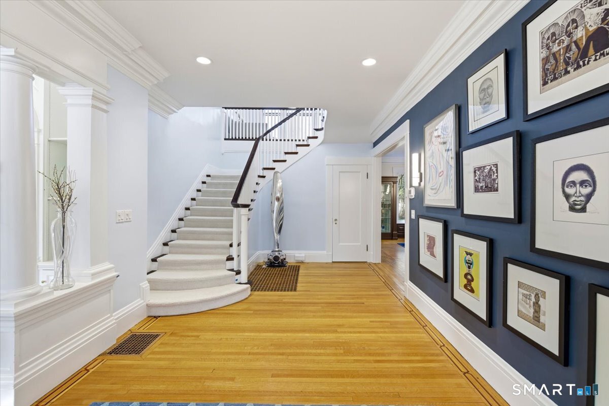 144 Edgehill Road Hamden, CT 06517 - Photo 2 of 39 26' long entrance foyer with elegant curved staircase