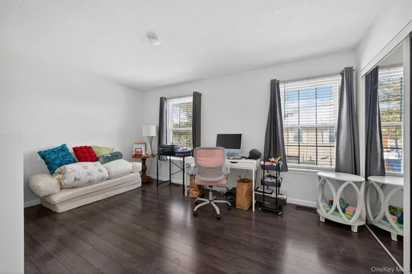 a view of livingroom with furniture and wooden floor
