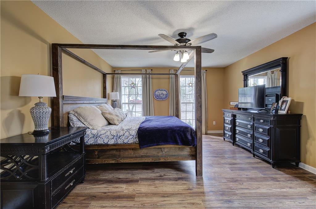 1703 Bryant Road Ranger, GA 30734 - Photo 23 of 71 a bedroom with a bed and wooden floor