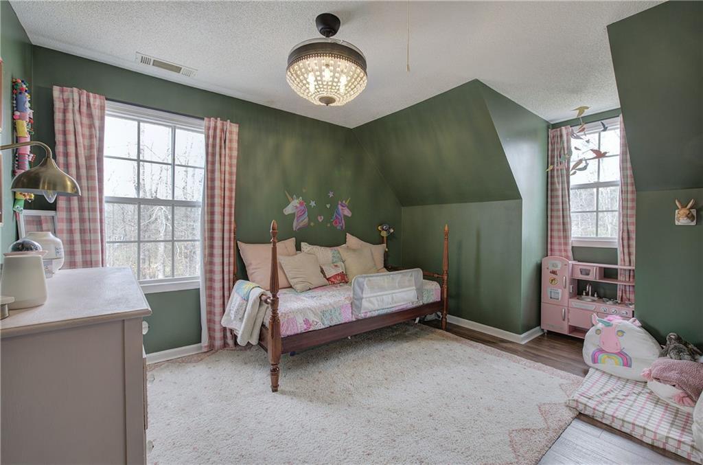 1703 Bryant Road Ranger, GA 30734 - Photo 33 of 71 a bedroom with a bed and a window