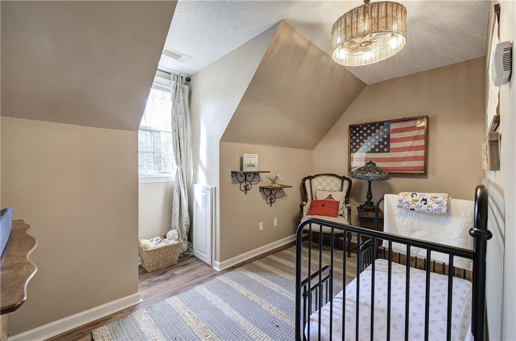 1703 Bryant Road Ranger, GA 30734 - Photo 35 of 71 a view of a hallway with entryway wooden floor and front door
