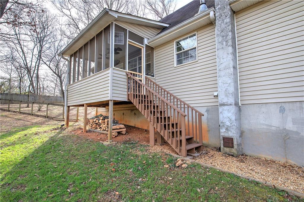 1703 Bryant Road Ranger, GA 30734 - Photo 40 of 71 a view of a house with backyard and sitting area
