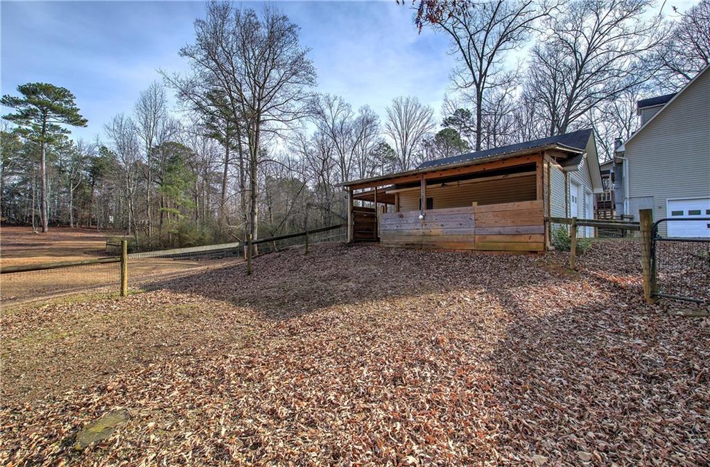 1703 Bryant Road Ranger, GA 30734 - Photo 63 of 71 a backyard of a house with lots of green space