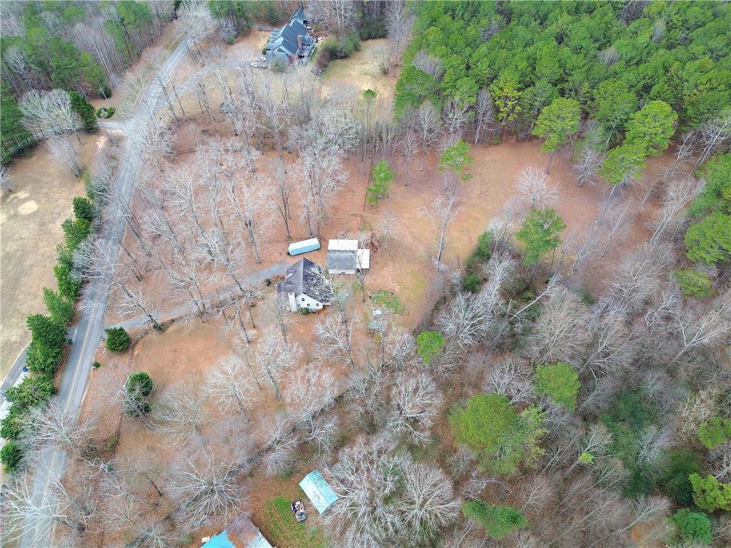 1703 Bryant Road Ranger, GA 30734 - Photo 68 of 71 a backyard of a house with a yard with outdoor seating
