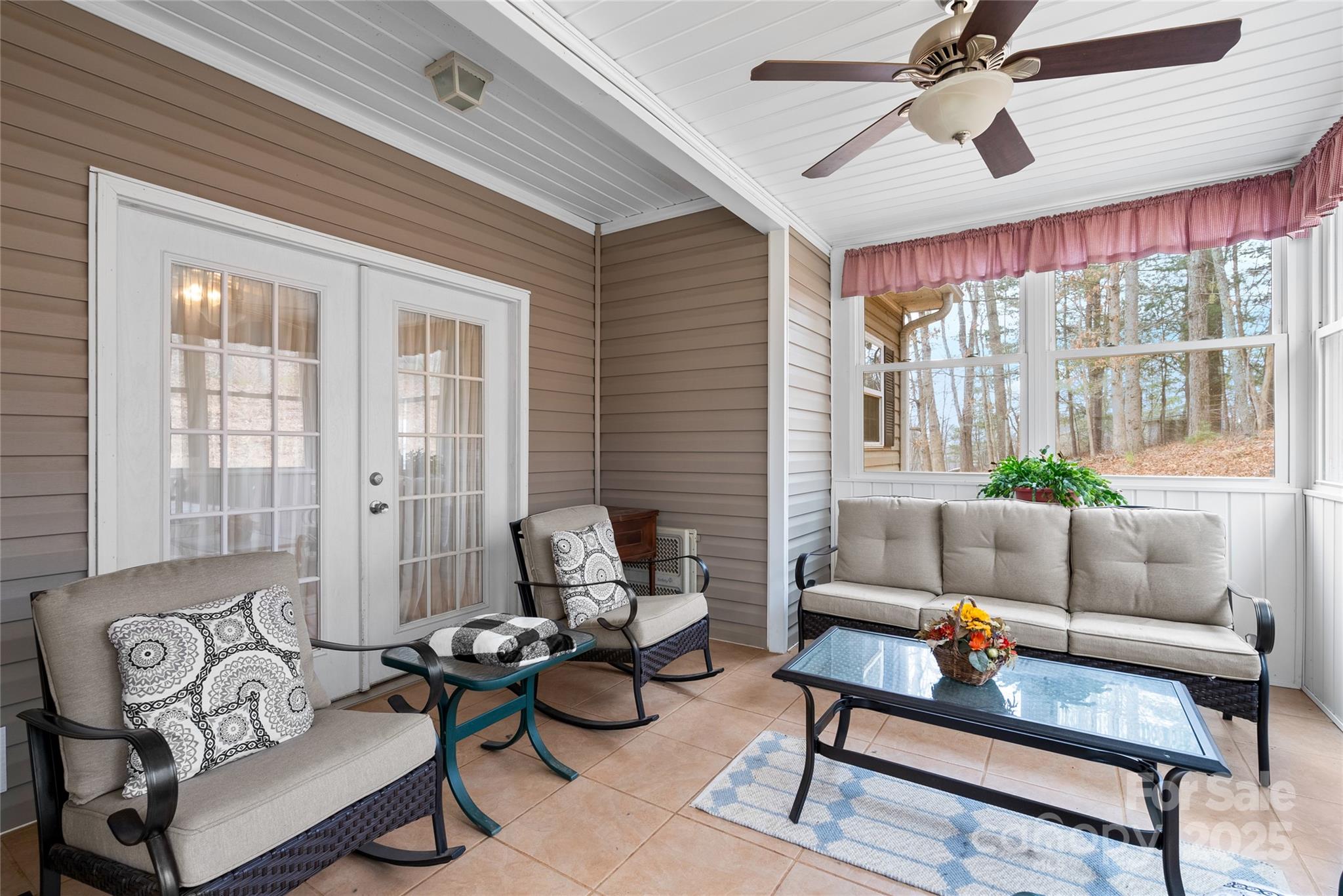 75 Pine Tree Drive Candler, NC 28715 - Photo 16 of 21 a living room with furniture and a large window