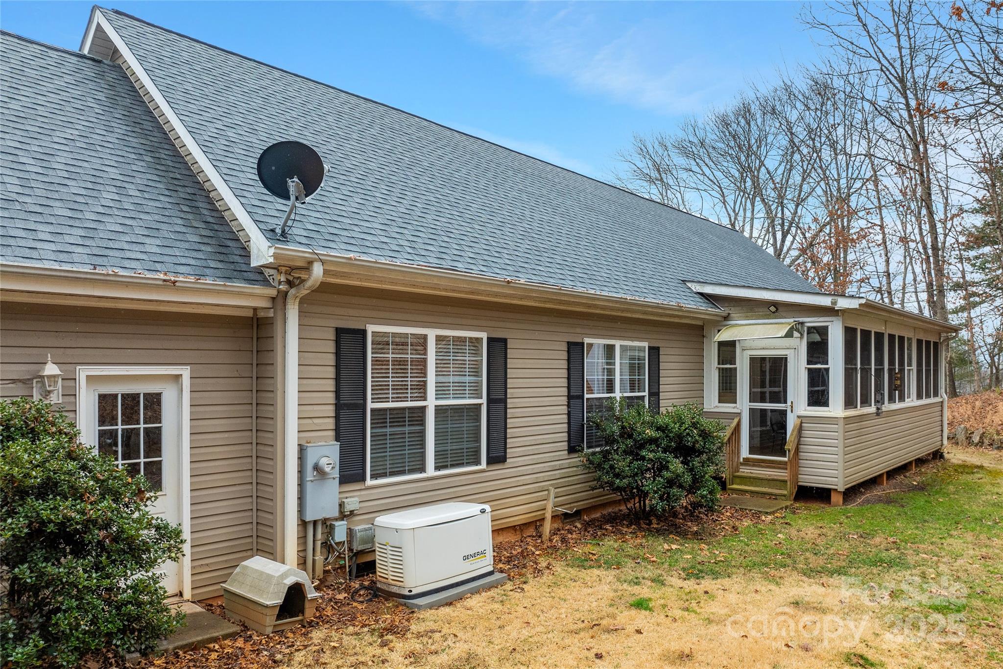 75 Pine Tree Drive Candler, NC 28715 - Photo 20 of 21 a front view of a house with garden