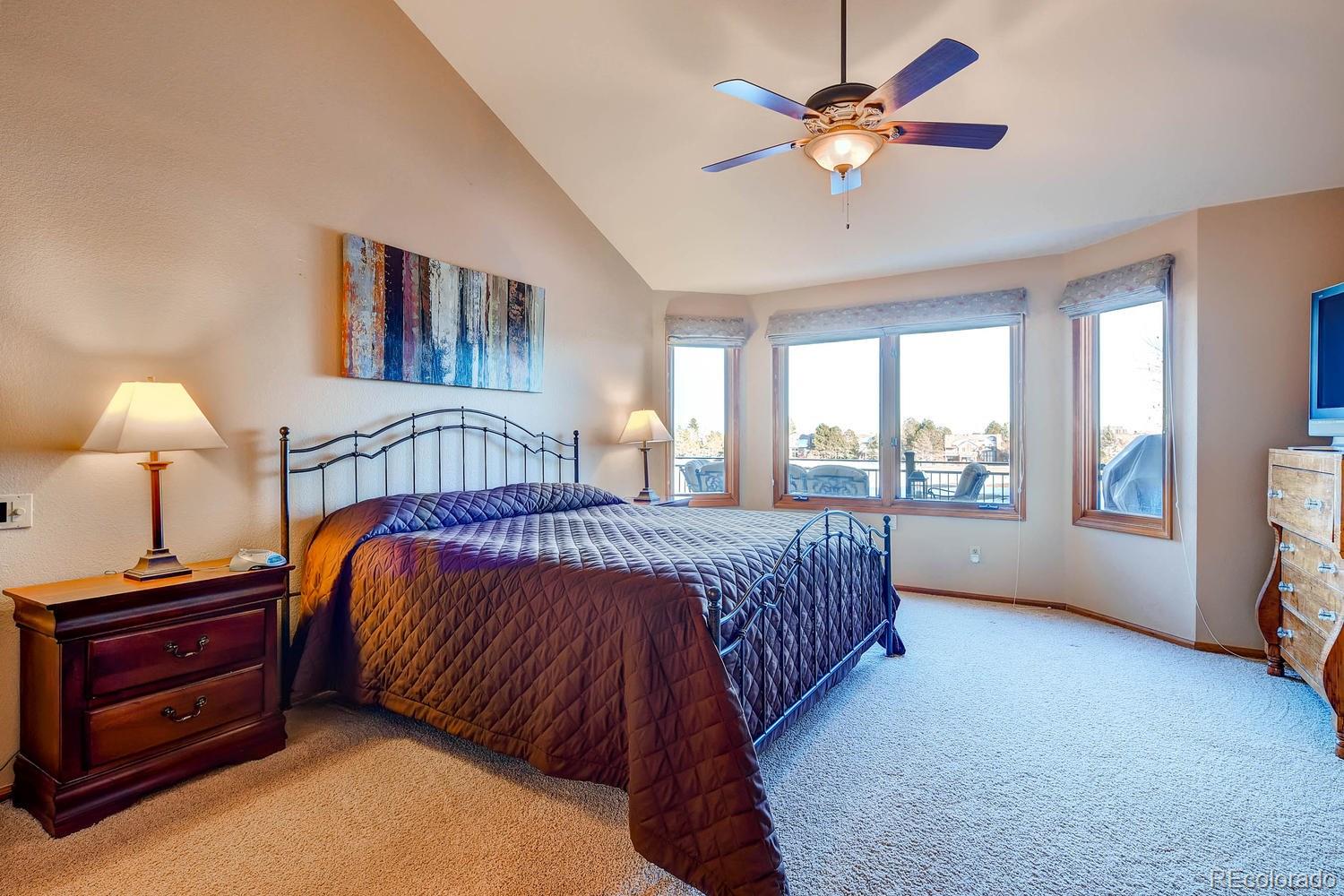 9470 Kemper Drive Lone Tree, CO 80124 - Photo 15 of 35 a bedroom with a bed and a window