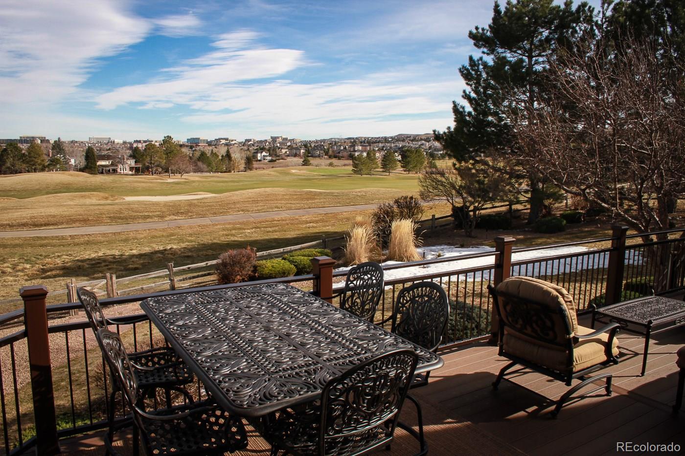 9470 Kemper Drive Lone Tree, CO 80124 - Photo 33 of 35 a terrace of a house with outdoor seating