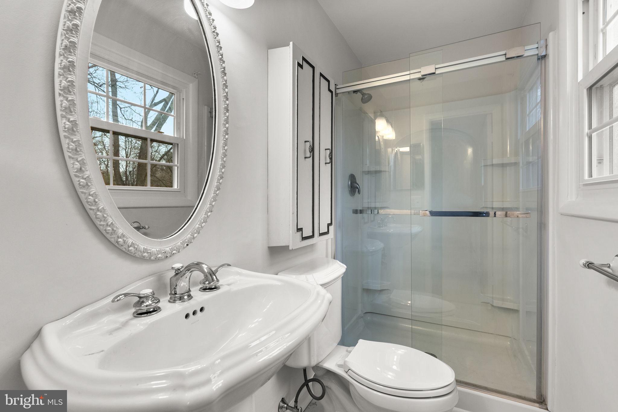 6170 Commodore Court Columbia, MD 21045 - Photo 23 of 49 a bathroom with a sink toilet and shower