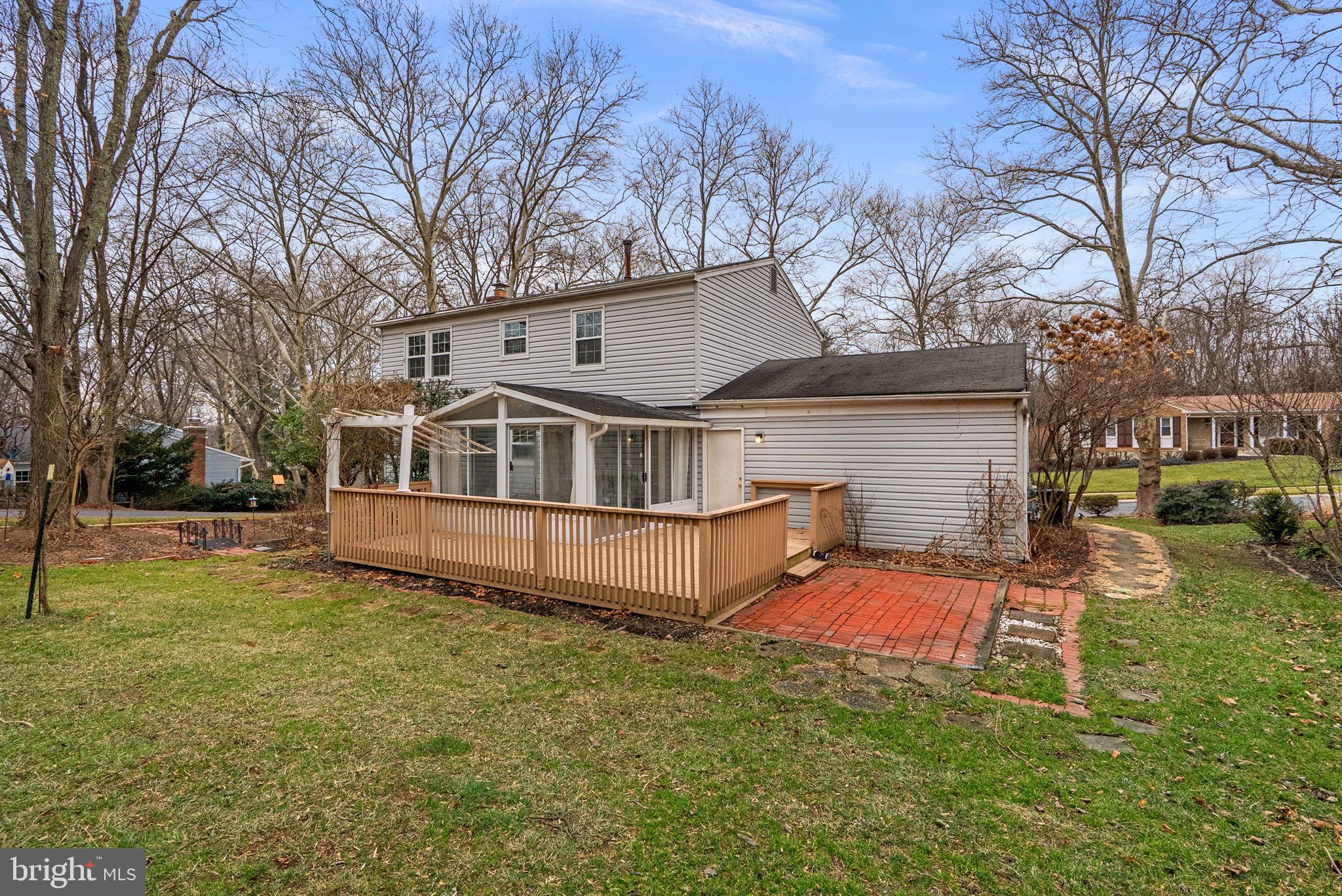 6170 Commodore Court Columbia, MD 21045 - Photo 38 of 49 a view of a house with a yard and sitting area
