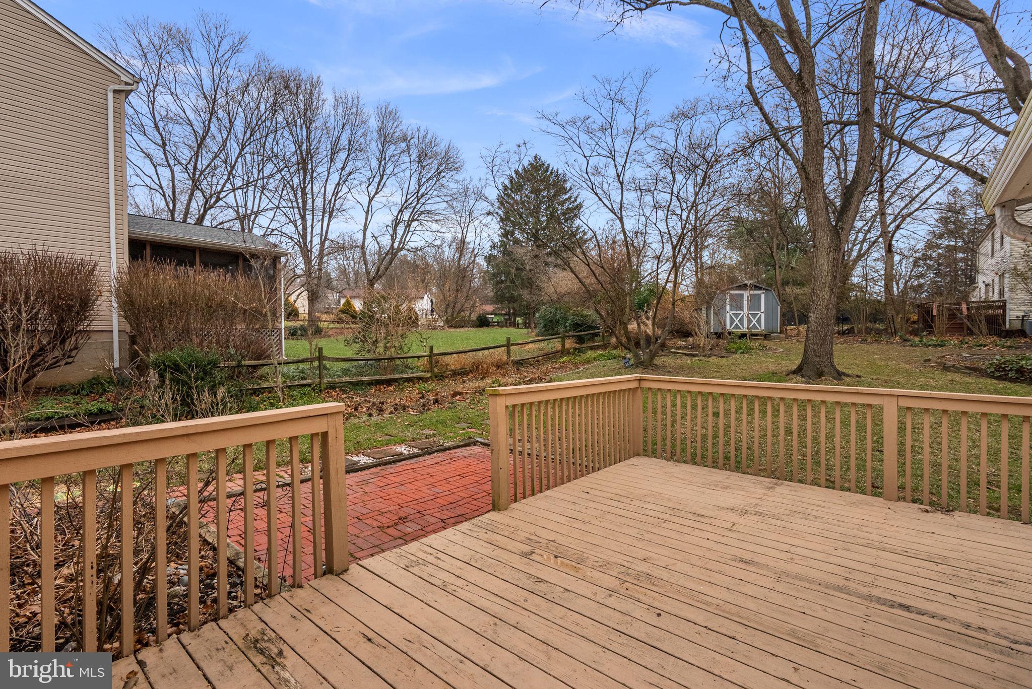 6170 Commodore Court Columbia, MD 21045 - Photo 39 of 49 a view of a wooden deck with a yard