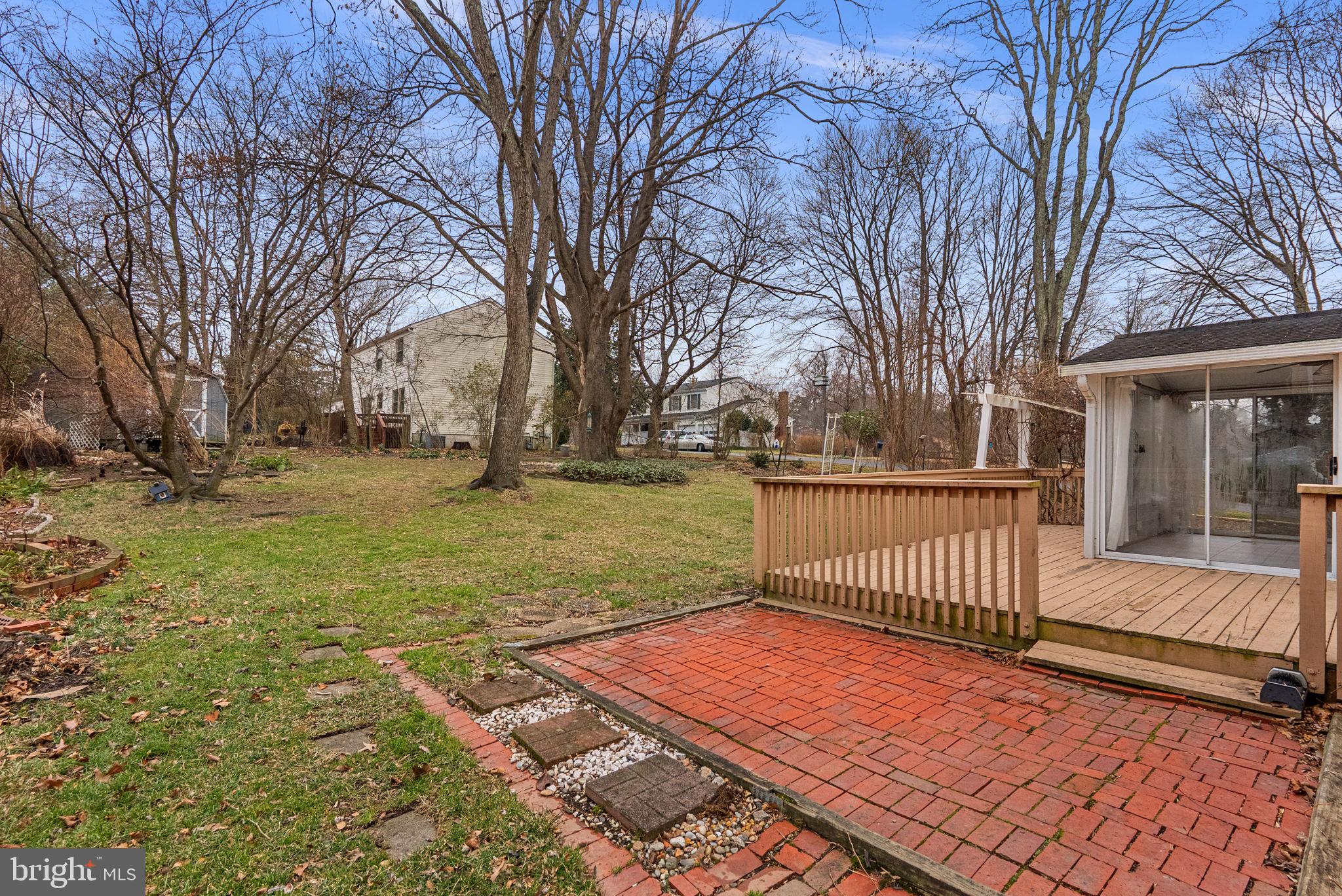 6170 Commodore Court Columbia, MD 21045 - Photo 40 of 49 a view of a yard with wooden fence