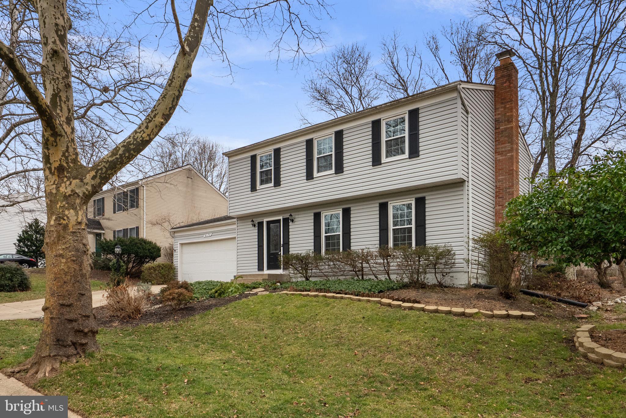 6170 Commodore Court Columbia, MD 21045 - Photo 42 of 49 a front view of a house with a yard