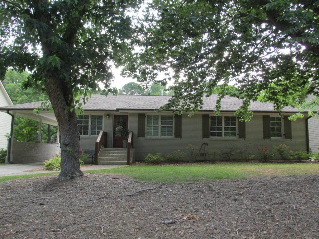 2435 Reed Street Smyrna, GA 30080 - Photo 1 of 1 a front view of a house with garden