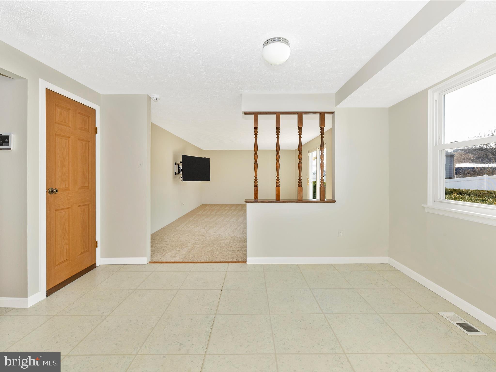 595 Old Stage Road Frederick, MD 21703 - Photo 16 of 43 a view of an empty room with a window