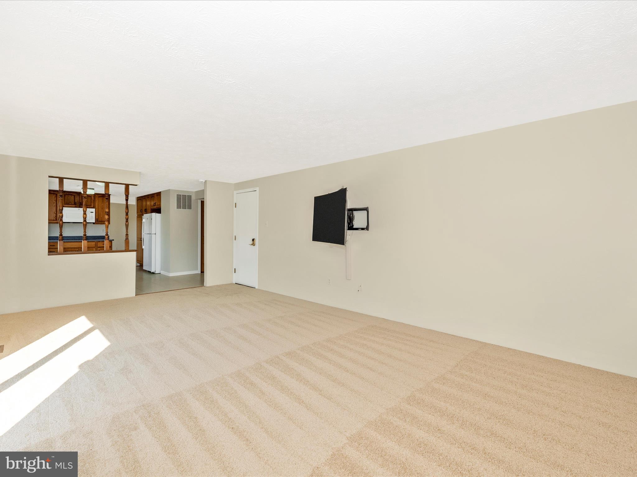 595 Old Stage Road Frederick, MD 21703 - Photo 20 of 43 a view of empty room with windows