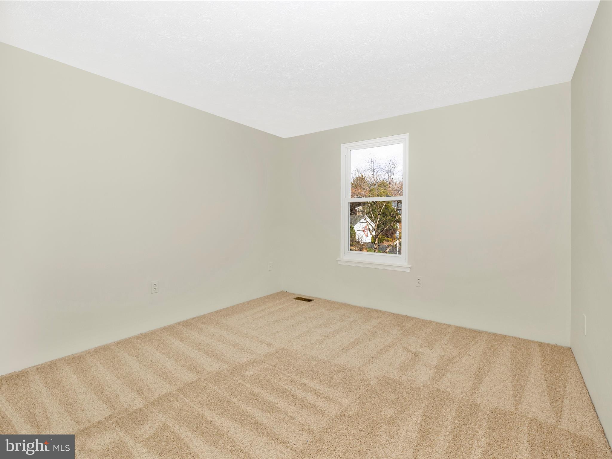 595 Old Stage Road Frederick, MD 21703 - Photo 27 of 43 an empty room with a window