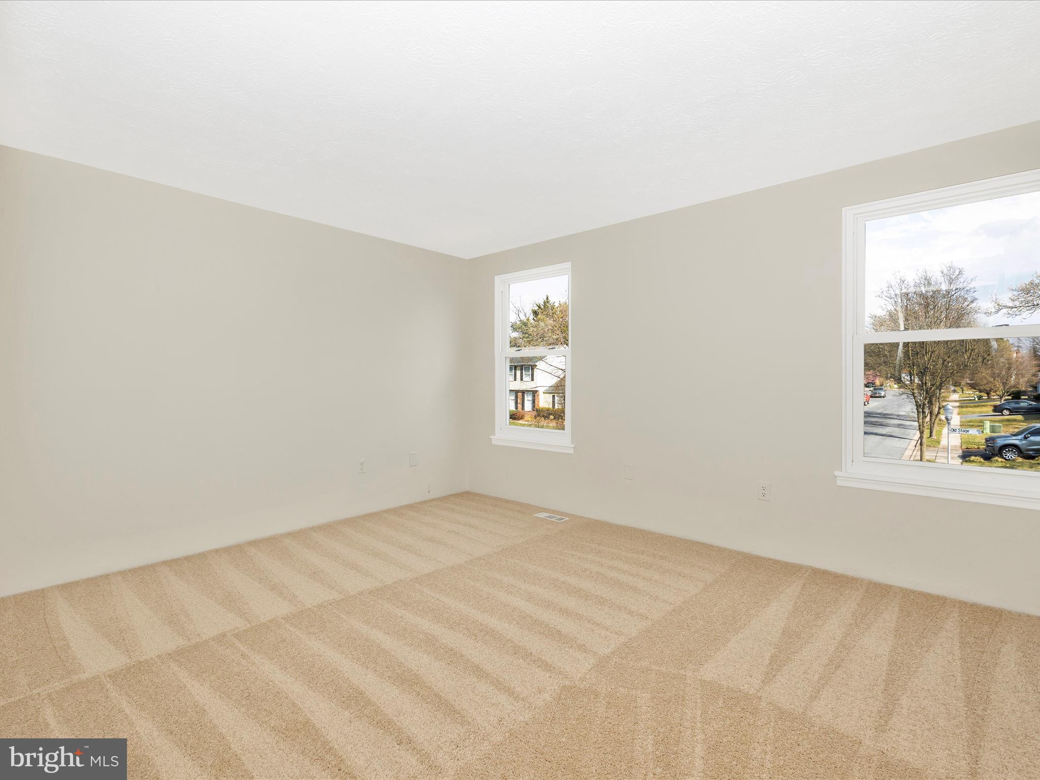 595 Old Stage Road Frederick, MD 21703 - Photo 29 of 43 an empty room with windows