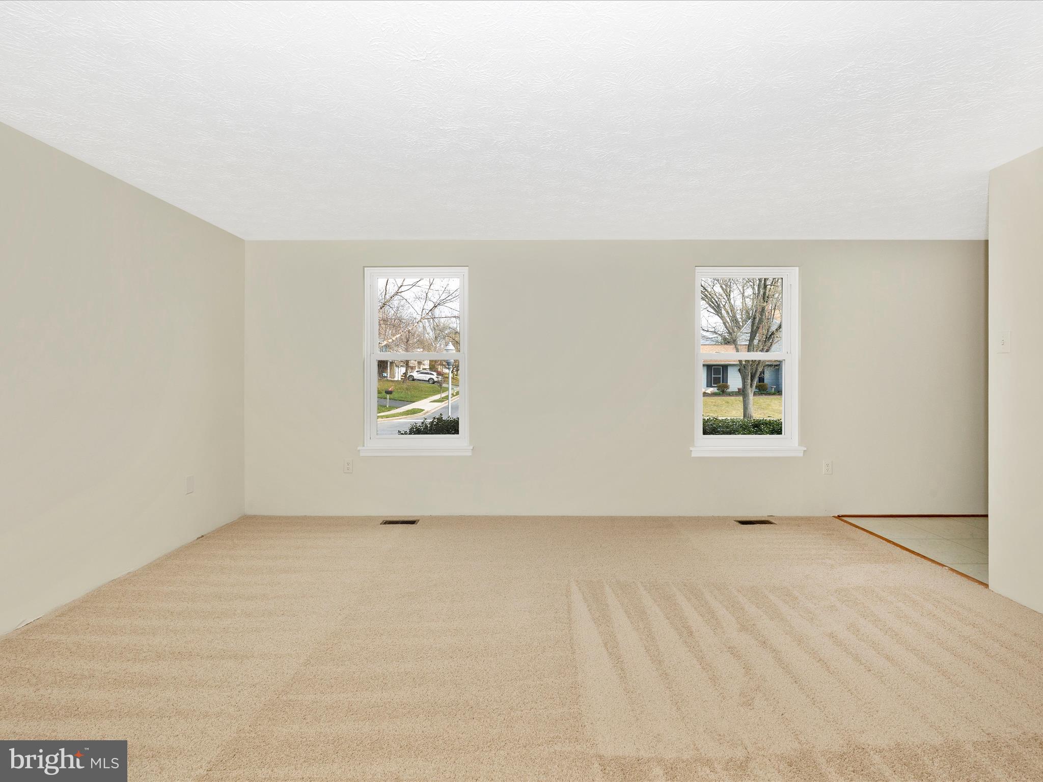 595 Old Stage Road Frederick, MD 21703 - Photo 6 of 43 an empty room with windows