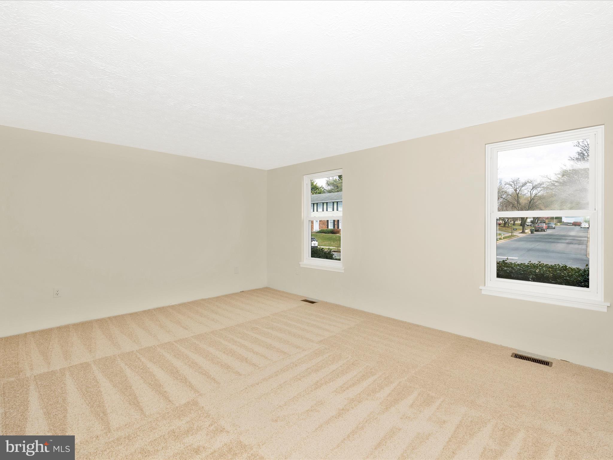 595 Old Stage Road Frederick, MD 21703 - Photo 7 of 43 an empty room with windows