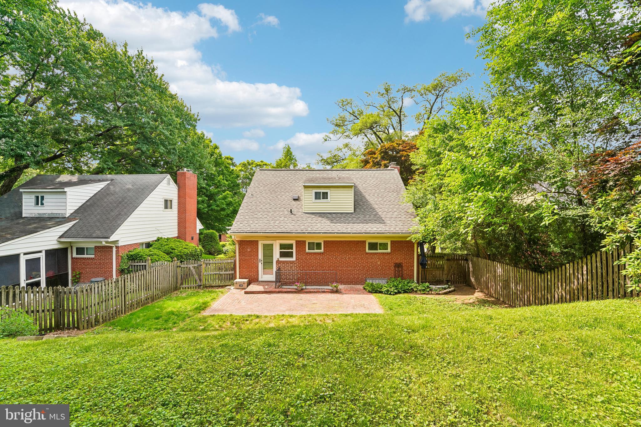 6640 Loch Hill Road Baltimore, MD 21239 - Photo 30 of 35 a front view of a house with a yard
