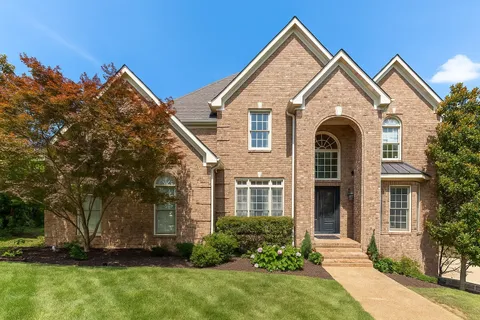 front view of house with a yard