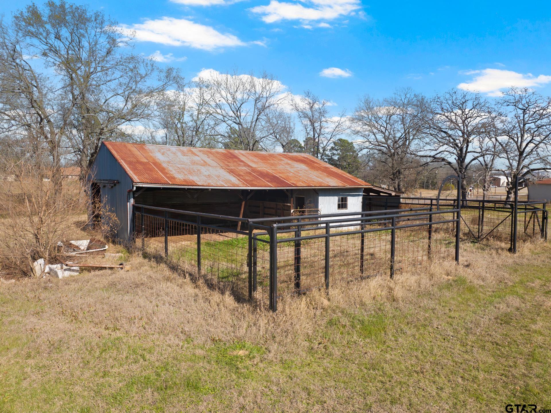 1402 And Nevills Road Mount Pleasant, TX 75455 - Photo 25 of 31 a view of an outdoor space with seating