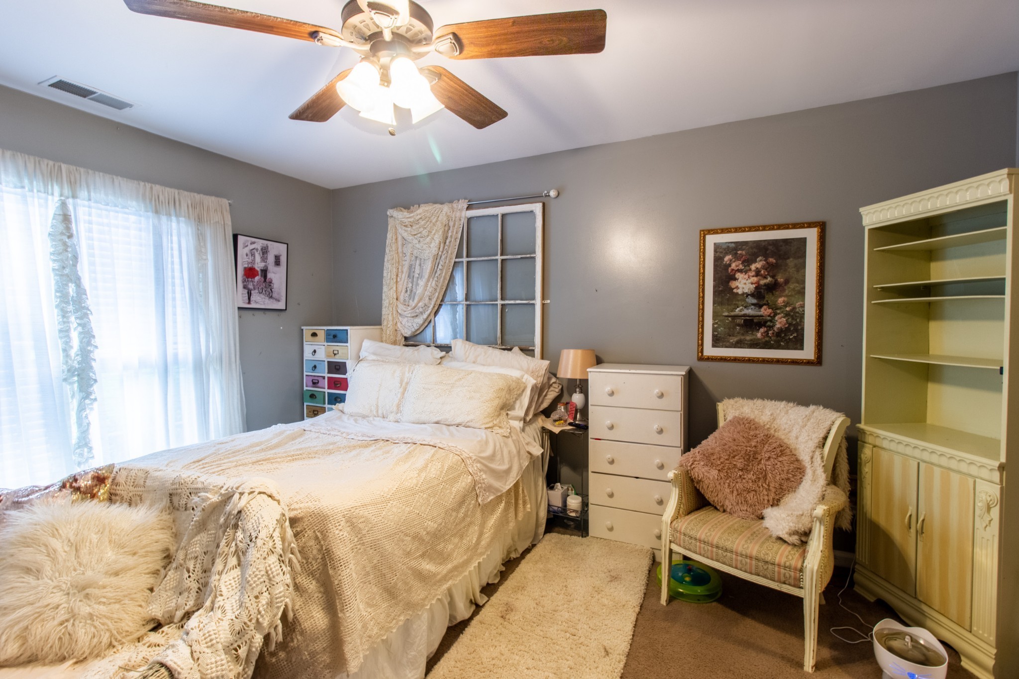1371 Cowan Road Dickson, TN 37055 - Photo 8 of 18 a bedroom with a bed and a couch