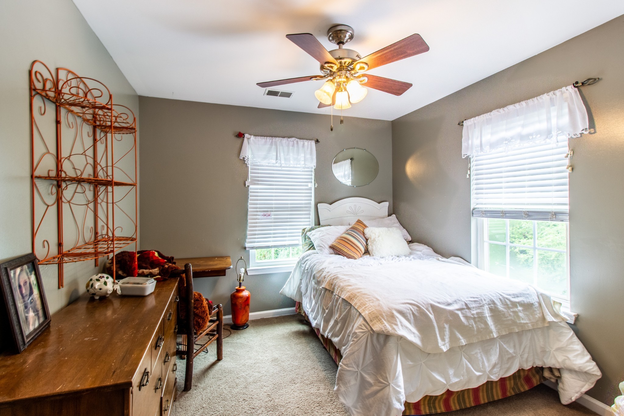 1371 Cowan Road Dickson, TN 37055 - Photo 10 of 18 a bedroom with a bed and a chandelier