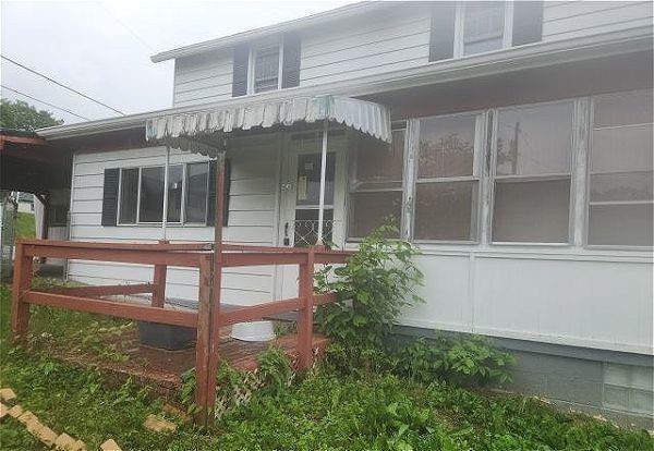 511 4th Avenue New Eagle, PA 15067 - Photo 1 of 14 front view of a house with a small yard