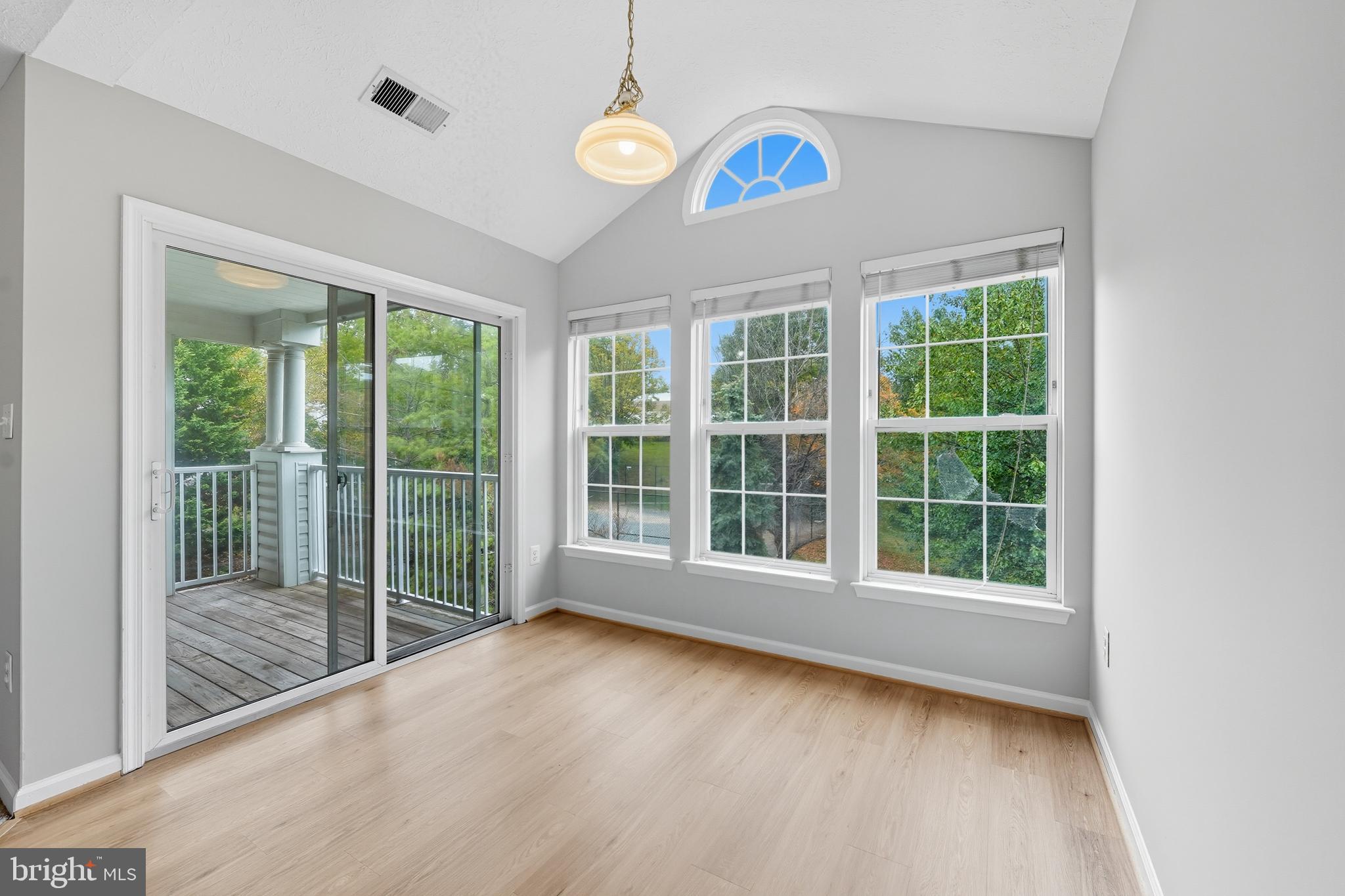 25910 Ridge Manor Drive, Unit 1000L Damascus, MD 20872 - Photo 20 of 51 Dining Room with Balcony access.